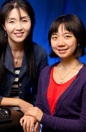 Professor and IGB faculty member Sua Myong, left, and graduate student Helen Hwang determined the action of proteins that regulate the caps on the ends of DNA strands, creating an assay that could be used to screen anti-cancer drugs. 
