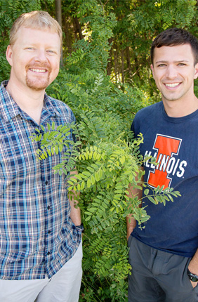 Researchers at the U. of I. found that plants vary a lot in the efficiency with which they uptake carbon dioxide and conserve water. Plant biology professor Andrew Leakey, left, mentored Kevin Wolz, who was an undergraduate at the time he conducted the research. Wolz now holds degrees in civil engineering and biology and is pursuing a doctorate in biology.