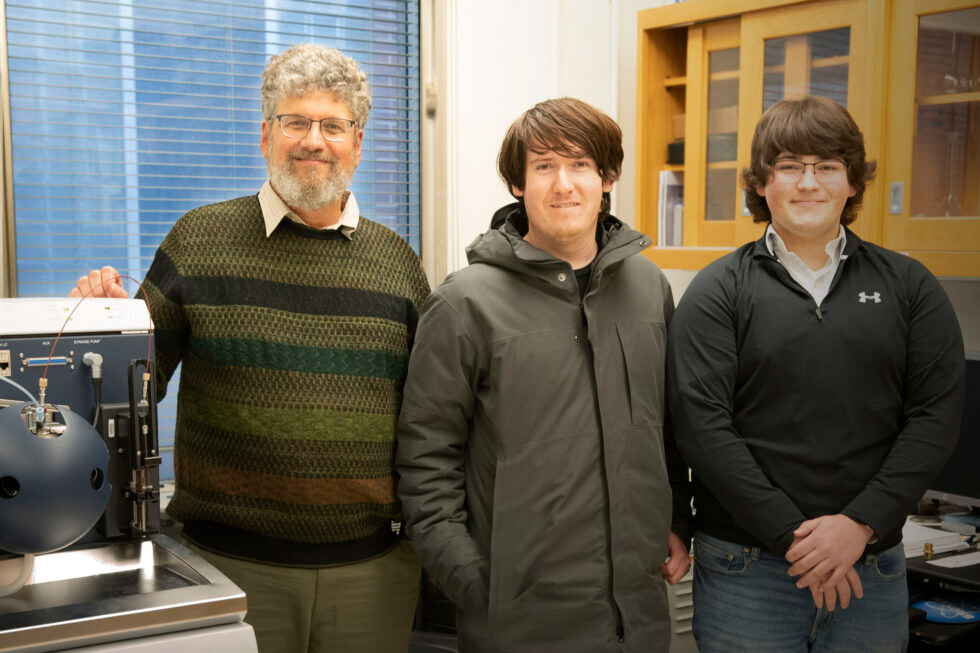 Jonathan Sweedler, professor in chemistry and Cancer Center at Illinois researcher, is pictured here with graduate students, from the left, Blake Mirman and Seth Croslow.