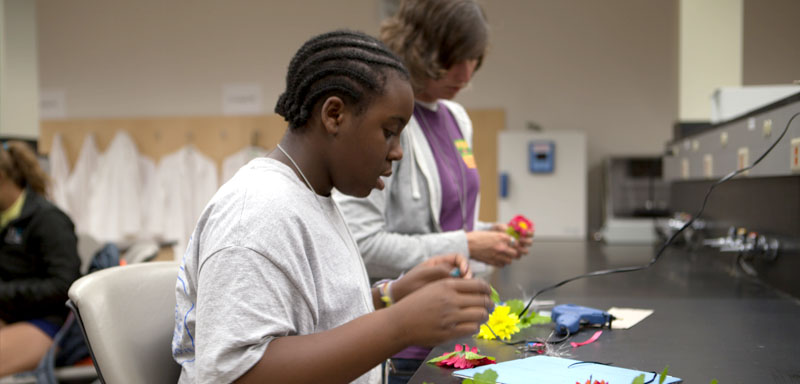 Building fiber optic flowers was one of the hands-on activities in the labs within the IGB.