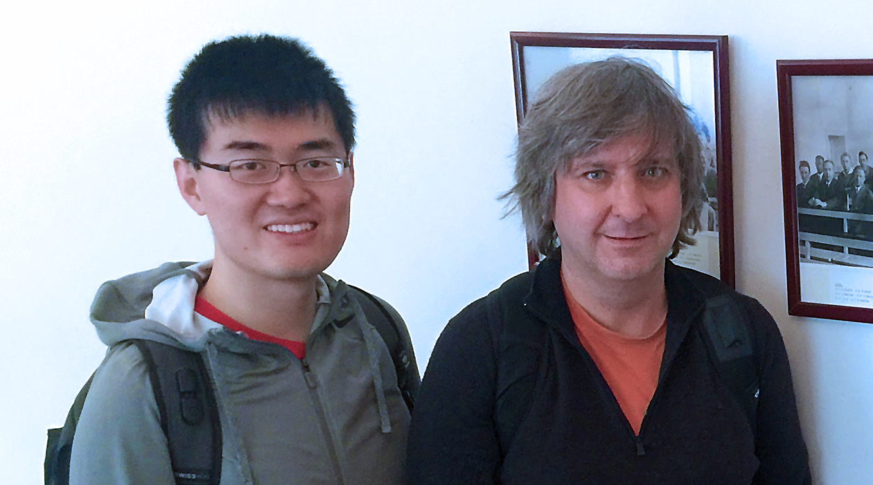 Biology professor Tong Wang (left) with bioengineering professor Sergei Maslov.