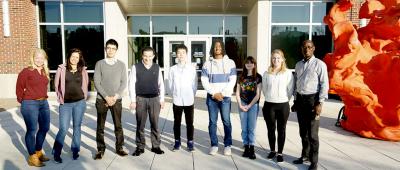 The University of Illinois and Mie University in Japan have collaborated on several studies of how the biome and its products affect human tissues and disease. Pictured, from left: Illinois researcher Mindy Baughma, Illinois postdoctoral researcher Janaina Cavalcante, Mie researcher Dr. Taro Yasuma, Mie professor Dr. Esteban C. Gabazza, Illinois students Jinyu Guo, Isaiah Lasisi, Sophia Nelson and Rebecca Hess and Illinois professor Isaac Cann. Photo courtesy of Isaac Cann