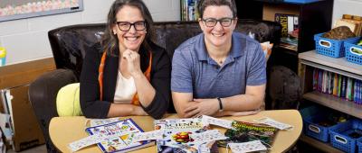 In a new book, U. of I. professors Rebecca Smith, left, Rachel Roegman, right, and their colleagues in public health describe how communities can work together to keep their K-12 students safe and learning during a public health crisis like the COVID-19 pandemic. Photo by Michelle Hassel