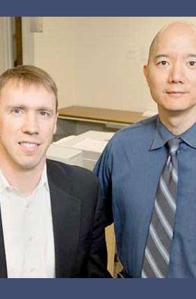 University of Illinois chemistry professor Paul Hergenrother, left, and veterinary clinical medicine professor Timothy Fan tested an anti-cancer compound in pet dogs that will be used in human clinical trials.