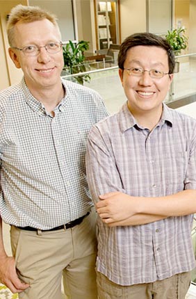 University of Illinois chemistry professor Wilfred van der Donk (left), postdoctoral researcher Kou-San Ju, microbiology professor William Metcalf and their colleagues used genome mining to discover many new natural products quickly and inexpensively.