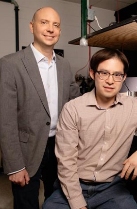 Chemical and biomolecular engineering professor Charles Schroeder, left, and graduate student Peter Zhou have found that single polymers -- acting as individuals -- work together to give synthetic materials macroscopic properties like viscosity and strength.