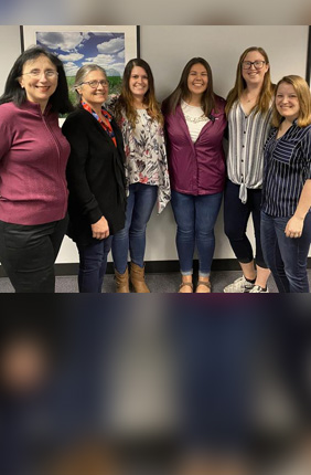 Research from the University of Illinois shows male piglets whose mothers were ill during pregnancy show genetic changes in the amygdala and are less resilient to a second stressful event, weaning, than females and piglets whose mothers weren't ill during pregnancy. From left: Sandra Rodriguez-Zas, Laurie Rund, Courtni Bolt, Olivia Perez, Haley Rymut, and Marissa Keever-Keigher