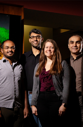The research team, including, from left, Nandan Haloi, Archit Kumar Vasan, Emily Geddes and Emad Tajkhorshid, invented and tested a new method for determining how chemical compounds interact with proteins in cells. Their approach offers atomic-level insight into the chemical properties that allow some antibiotics to pass through pores in the cell membranes of Gram-negative bacteria.