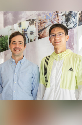 Chris Brooke, an associate professor of microbiology (left) with lead author and graduate student Tongyu Liu