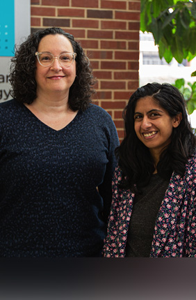 Cari Vanderpool, left, and Sabrina Abdulla uncovered how the small RNAs Spot 42 and SdsR help Salmonella express their virulence genes.