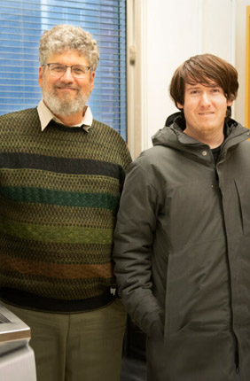 Jonathan Sweedler, professor in chemistry and Cancer Center at Illinois researcher, is pictured here with graduate students, from the left, Blake Mirman and Seth Croslow.