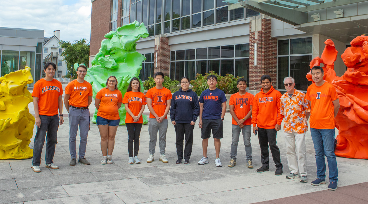 The authors highlighted their collaborative team effort by sporting their Illini Orange and Blue. From left to right: Hankeun Lee, Joseph Tibbs, Amanda Bacon, Takhmina Ayupova, Leyang Liu, Anqi Tan, Wang-Chien Chen, Saurabh Umrao, Seemesh Bhaskar, Brian Cunningham, Xing Wang / Isaac Mitchell