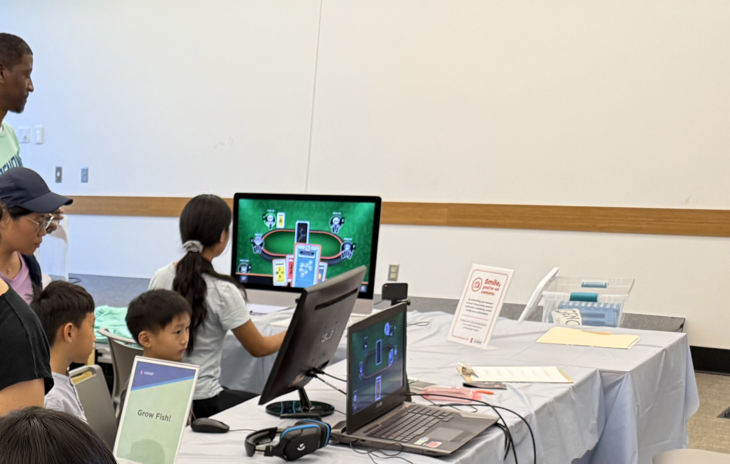Genome Day participant playing Grow Fish! online, Champaign Public Library, 2025
