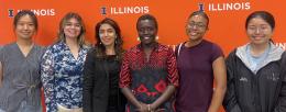 From left to right: Minxing Zhu, Frania Amaya, Zohreh Golshani, Dr. Esther Ngumbi, Lakiyah Smith, & Nhi Do at the research symposium.