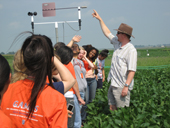 Photo of students in field during GAMES event.