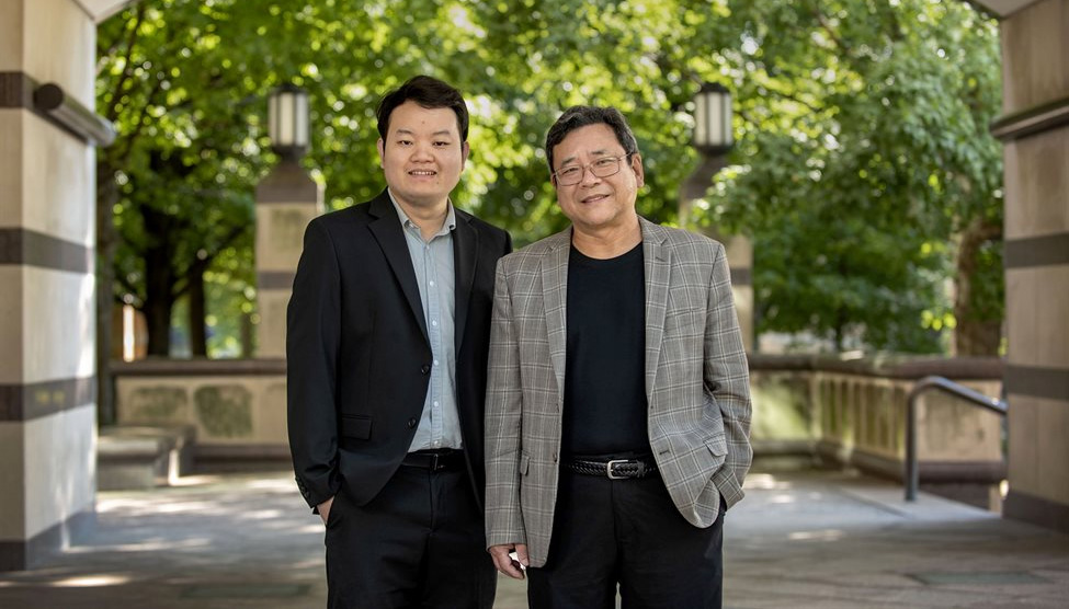 Cancer Center at Illinois researchers Hua Wang, left, and Shuming Nie, pictured at Beckman Institute, will take their collaboration in cancer research to the next level with their  2.26 M NCI grant. (Photo by Heather Coit)