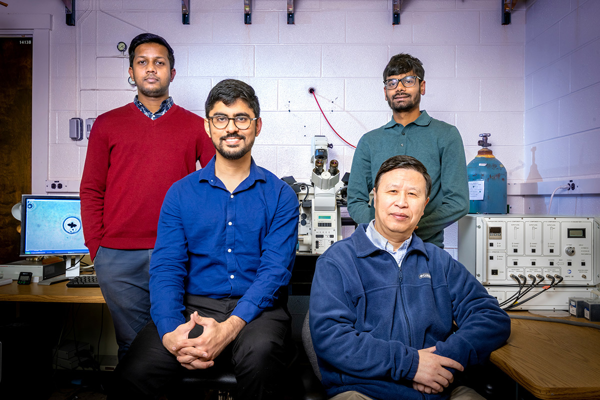 Professor Ning Wang, front right, is joined by researchers, from left, Fazlur Rashid, Kshitij Amar and Parth Bhala. 