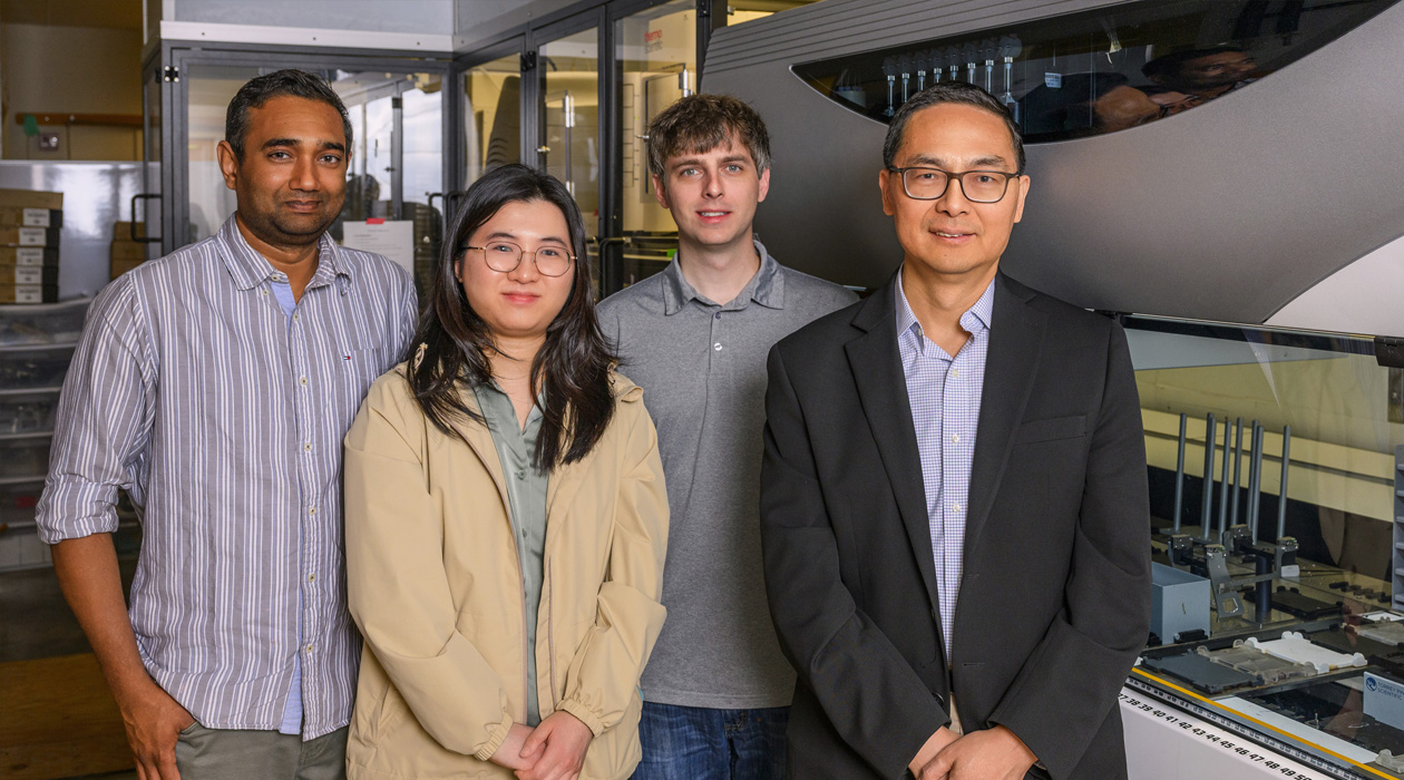 With AI to guide enzyme improvement and automated synthetic biology to rapidly make and test new variants, Illinois researchers developed a user-friendly system to drastically improve enzyme performance. Pictured, from left: Nilmani Singh, Jingxia Lu, Stephen Lane and Professor Huimin Zhao. 
