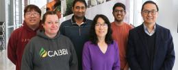 The research team included, back row, from left, Shih-I (Harry) Tan, Nilmani Singh, Aashutosh Boob, and front row, from left, Teresa Martin, Li-Qing Chen, and Huimin Zhao. / Julia Pollack