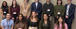 The 2024-2025 Tracy Undergraduate Team Science Training Program cohort, with Mark Tracy (back, center) and Tracy Parish (back, right). / Sarah Schwartz 