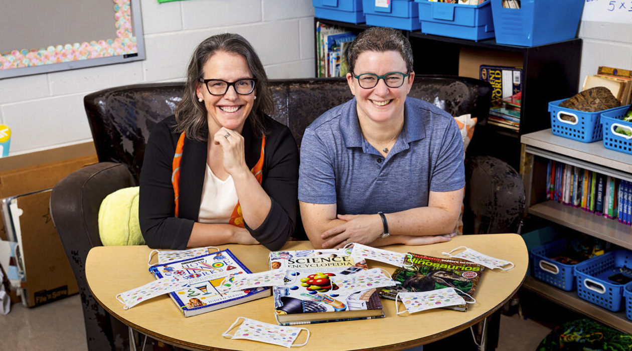 In a new book, U. of I. professors Rebecca Smith, left, Rachel Roegman, right, and their colleagues in public health describe how communities can work together to keep their K-12 students safe and learning during a public health crisis like the COVID-19 pandemic. Photo by Michelle Hassel