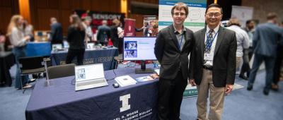 Stephan Lane, left, and Huimin Zhao at the Robotics Showcase and Demo Day.