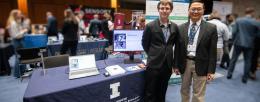 Stephan Lane, left, and Huimin Zhao at the Robotics Showcase and Demo Day.
