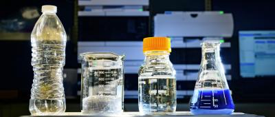 Researchers used microbes to convert plastic waste into pyruvate, an essential energy source for microbes that use it to generate other useful products. As a proof-of-concept experiment, they converted polyethylene terephthalate, or PET, from plastic bottles into the blue dye indigoidine. Photo by Fred Zwicky