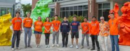 The authors highlighted their collaborative team effort by sporting their Illini Orange and Blue. From left to right: Hankeun Lee, Joseph Tibbs, Amanda Bacon, Takhmina Ayupova, Leyang Liu, Anqi Tan, Wang-Chien Chen, Saurabh Umrao, Seemesh Bhaskar, Brian Cunningham, Xing Wang / Isaac Mitchell