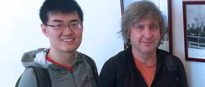 Biology professor Tong Wang (left) with bioengineering professor Sergei Maslov.